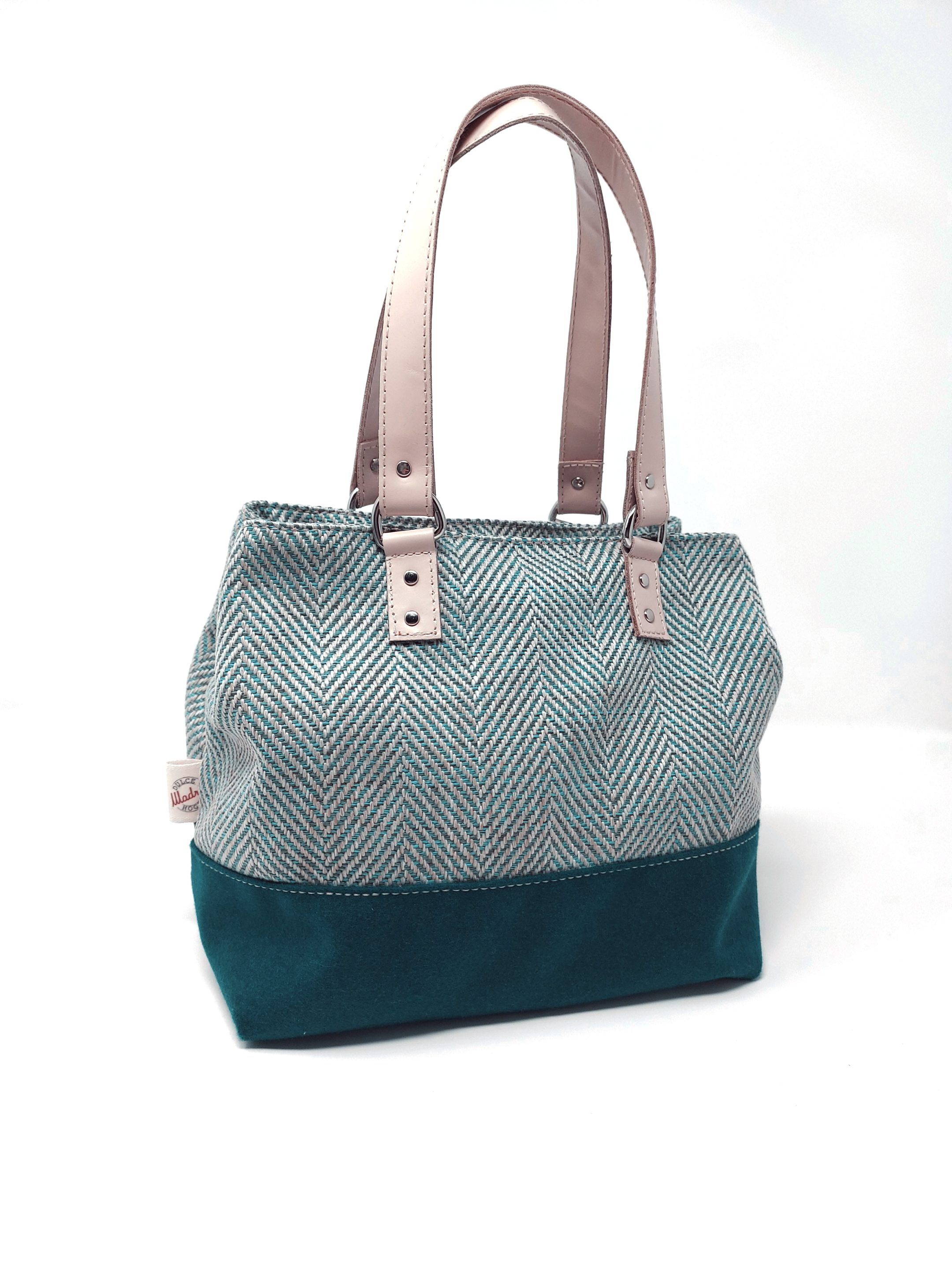 Bolso mediano verde con estampado en espiga y asas de mano de piel
