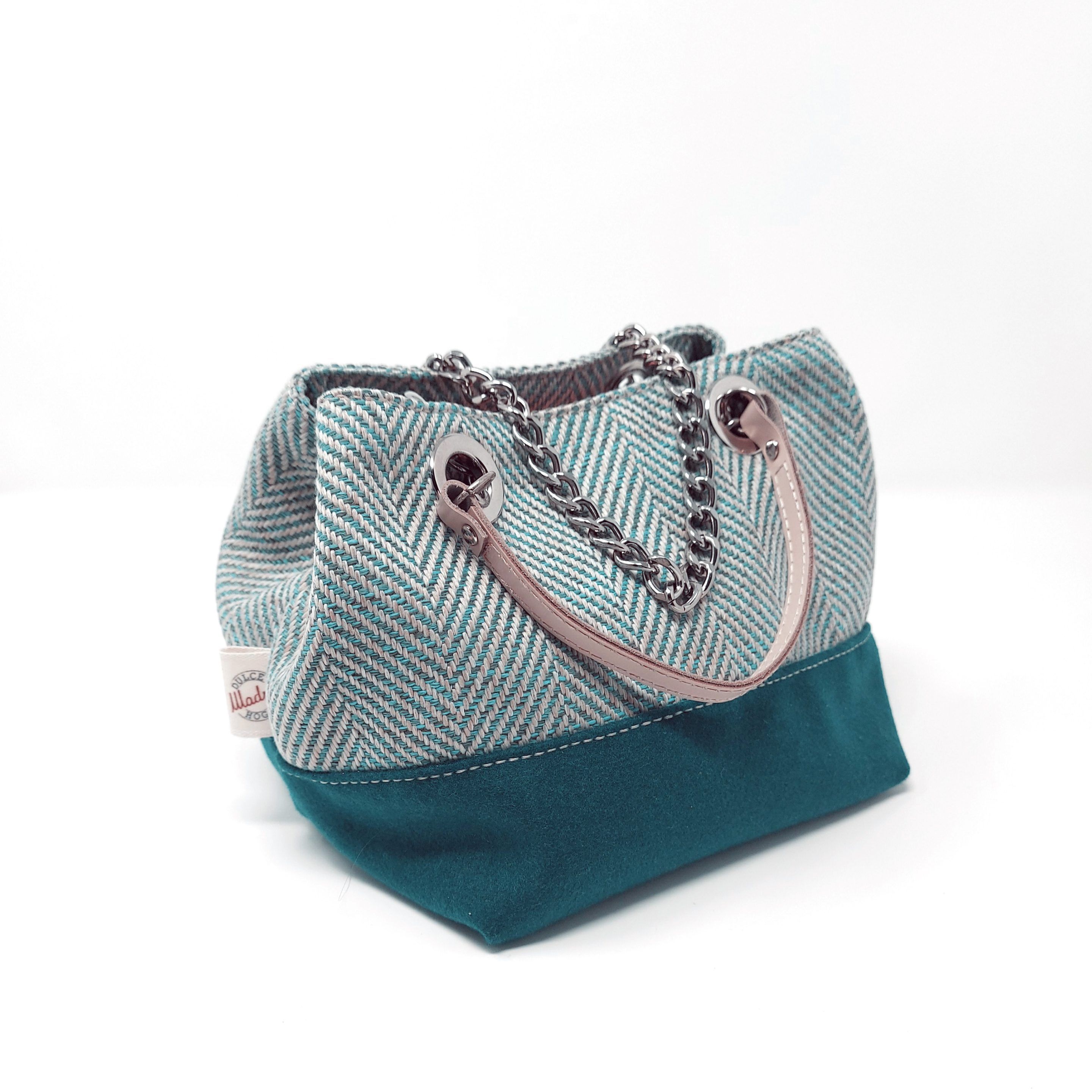 Bolso de mano color turquesa oscuro estampado en espiga con correa de cadena