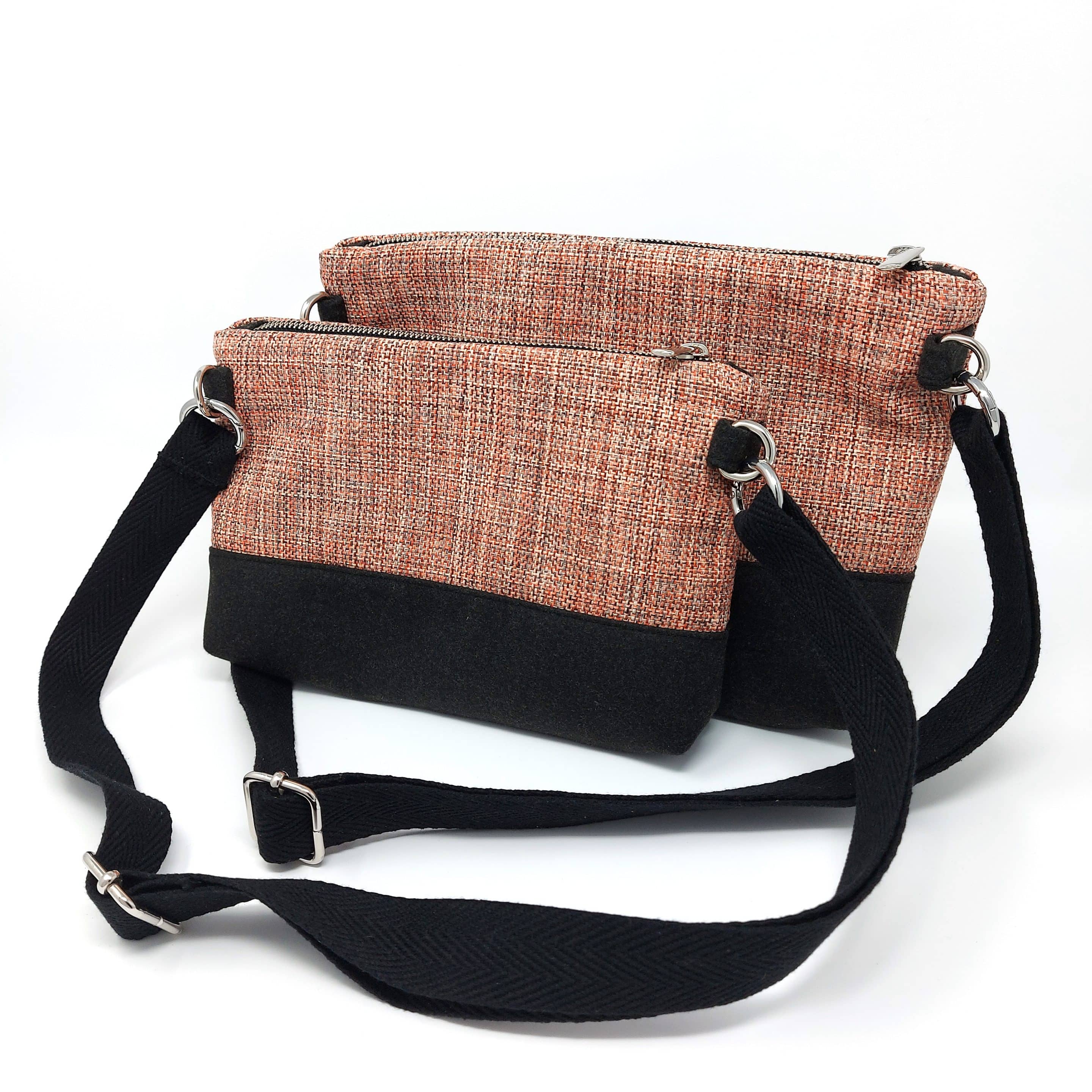 Carteras de mano en gris antracita y jaspeado rojo y bandolera de algodón